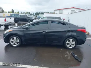 2012 Hyundai Elantra GLS with VIN KMHDH4AE8CU404698, listed as a IAAI auction lot 41988964 with 1 mi miles. Bid and sale history available at carsss.com. Image 14.