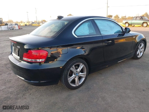 2013 BMW 1 Series 128i with VIN WBAUP9C53DVS95917, listed as a IAAI auction lot 41398338 with 52,160 mi miles. Bid and sale history available at carsss.com. Image 4.