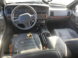 1998 Jeep Grand Cherokee Laredo with VIN 1J4GZ48Y9WC203024, listed as a Copart auction lot 83813114 with 105,044 mi miles and Non Repairable. Bid and sale history available at carsss.com. Image 8.