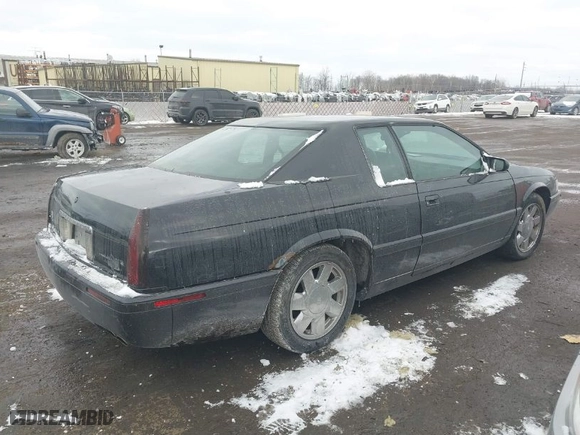 2001 Cadillac Eldorado ESC with VIN 1G6EL12Y01B103000, listed as a IAAI auction lot 41395721 with 0 mi miles. Bid and sale history available at carsss.com. Image 4.