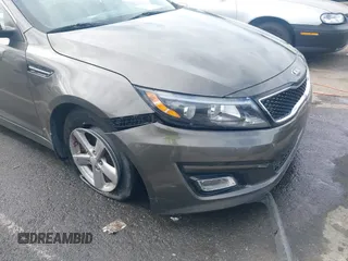 2015 Kia Optima LX with VIN 5XXGM4A72FG400848, listed as a IAAI auction lot 40802198 with 173,270 mi miles and . Bid and sale history available at DreamBid. Image 6.
