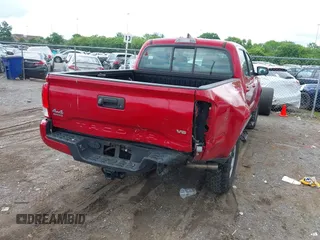2017 Toyota Tacoma SR5 with VIN 3TMCZ5AN1HM096532, listed as a IAAI auction lot 42210514 with 56,832 mi miles and . Bid and sale history available at DreamBid. Image 4.