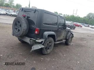 2007 Jeep Wrangler Rubicon with VIN 1J4GA64117L149666, listed as a IAAI auction lot 42252464 with 100,791 mi miles and . Bid and sale history available at DreamBid. Image 4.