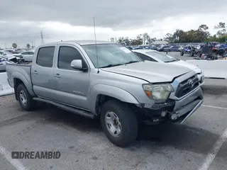 2014 Toyota Tacoma PreRunner with VIN 5TFJX4GNXEX029898, listed as a IAAI auction lot 42190406 with 87,998 mi miles and . Bid and sale history available at DreamBid. Image 1.