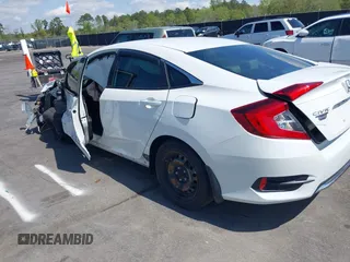 2020 Honda Civic LX with VIN 2HGFC2F61LH568767, listed as a IAAI auction lot 41909755 with 56,213 mi miles and . Bid and sale history available at DreamBid. Image 3.