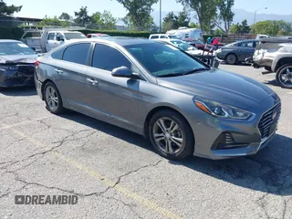 2018 Hyundai Sonata SEL z VIN 5NPE34AF1JH624983, wystawiony jako IAAI lot #42395553 z przebiegiem 113 952 mil mil oraz . Historia ofert i sprzedaży dostępna na DreamBid. Obrazek 1.