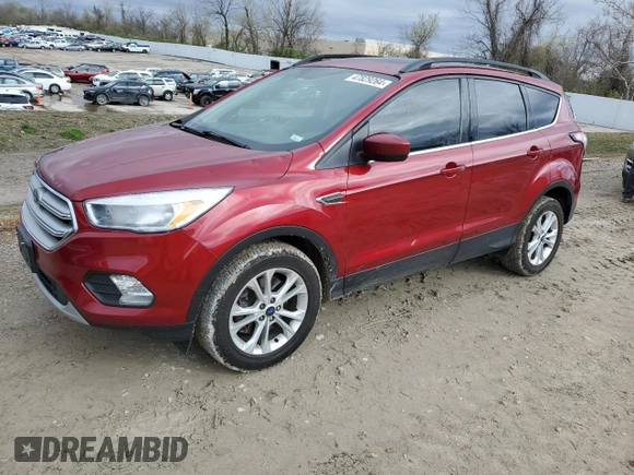 2018 Ford Escape SE z VIN 1FMCU9GD1JUC72707, wystawiony jako Copart lot #47829264 z przebiegiem 96 341 mil mil oraz Szkoda całkowita • Salvage title. Historia ofert i sprzedaży dostępna na DreamBid. Obrazek 1.