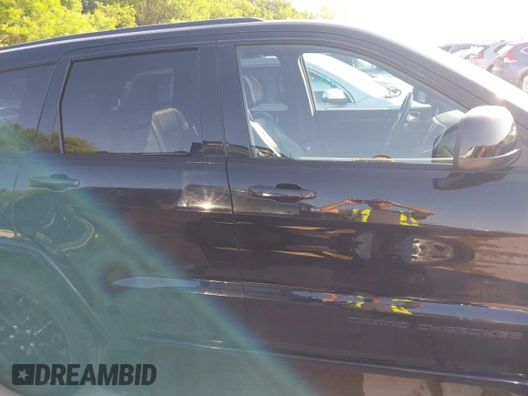 2017 Jeep Grand Cherokee Laredo with VIN 1C4RJFAGXHC817666, listed as a IAAI auction lot 42036817 with 119,698 mi miles. Bid and sale history available at carsss.com. Image 13.