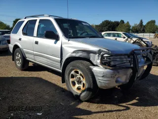 2001 Isuzu Rodeo S with VIN 4S2CK58W914301037, listed as a Copart auction lot 72153074 with 230,781 mi miles and Clean Title. Bid and sale history available at DreamBid. Image 4.
