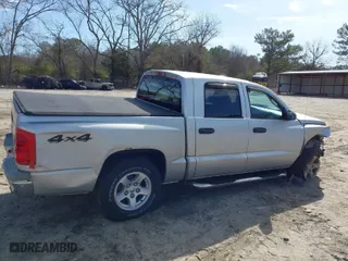 2005 Dodge Dakota SLT with VIN 1D7HW48N35S219514, listed as a IAAI auction lot 41744500 with 132,000 mi miles. Bid and sale history available at carsss.com. Image 3.