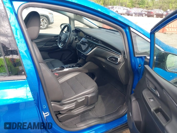 2023 Chevrolet Bolt EV 2LT z VIN 1G1FX6S05P4128607, wystawiony jako IAAI lot #42081752 z przebiegiem 22 551 mil mil oraz . Historia ofert i sprzedaży dostępna na DreamBid. Obrazek 5.