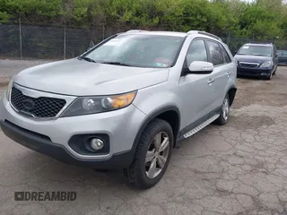 2012 Kia Sorento EX with VIN 5XYKU4A2XCG256830, listed as a IAAI auction lot 42031102 with 200,957 mi miles. Bid and sale history available at carsss.com. Image 2.