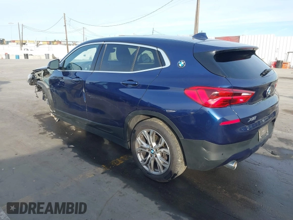 2020 BMW X2 sDrive28i with VIN WBXYH9C02L5P01502, listed as a IAAI auction lot 41397416 with 82,660 mi miles. Bid and sale history available at carsss.com. Image 3.