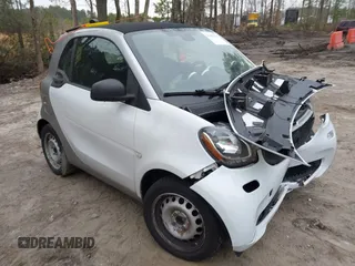 2017 Smart fortwo Pure z VIN WMEFJ5DA4HK169267, wystawiony jako IAAI lot #41803911 z przebiegiem 80 364 mil mil oraz . Historia ofert i sprzedaży dostępna na DreamBid. Obrazek 1.