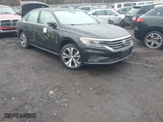 2021 Volkswagen Passat 2.0T SE with VIN 1VWSA7A39MC011751, listed as a IAAI auction lot 41485032 with 999,999 mi miles. Bid and sale history available at carsss.com. Image 1.