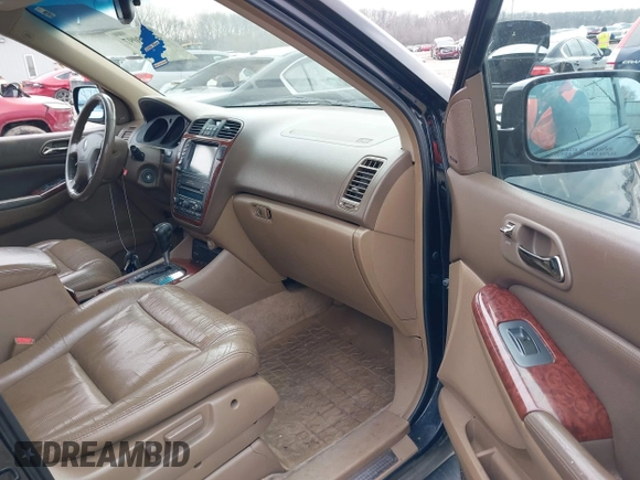 2005 Acura MDX Touring with VIN 2HNYD18945H514351, listed as a IAAI auction lot 41688097 with 323,000 mi miles. Bid and sale history available at carsss.com. Image 5.