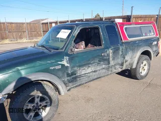 2002 Ford Ranger XL Fleet with VIN 1FTZR45EX2PA41562, listed as a IAAI auction lot 41518437 with 302,842 mi miles. Bid and sale history available at carsss.com. Image 6.