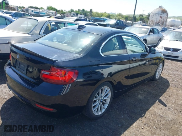 2016 BMW 2 Series 228i with VIN WBA1F9C5XGV545664, listed as a IAAI auction lot 39327505 with 94,583 mi miles. Bid and sale history available at carsss.com. Image 4.