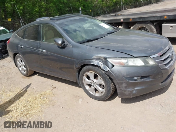 2012 Honda Crosstour EX-L z VIN 5J6TF2H53CL011899, wystawiony jako IAAI lot #42182571 z przebiegiem 154 801 mil mil oraz . Historia ofert i sprzedaży dostępna na DreamBid. Obrazek 1.