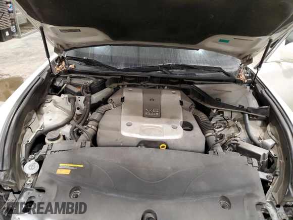 2013 Infiniti M z VIN JN1BY1AP8DM511833, wystawiony jako Copart lot #42874265 z przebiegiem 152 708 mil mil oraz Czysty tytuł • Clean title. Historia ofert i sprzedaży dostępna na DreamBid. Obrazek 11.