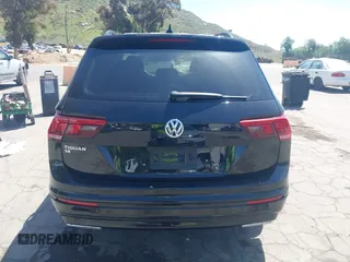 2021 Volkswagen Tiguan SE with VIN 3VV3B7AX0MM015825, listed as a IAAI auction lot 41955268 with 57,909 mi miles and . Bid and sale history available at DreamBid. Image 16.