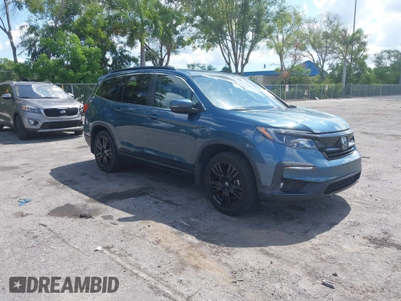 2021 Honda Pilot Special Edition with VIN 5FNYF5H25MB041980, listed as a IAAI auction lot 39597428 with 43,167 mi miles and . Bid and sale history available at carsss.com. Image 1.