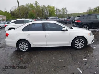 2011 Volkswagen Jetta Sedan SE w/Convenience & Sunroof PZEV with VIN 3VWDZ7AJ4BM385356, listed as a IAAI auction lot 42012728 with 169,045 mi miles. Bid and sale history available at carsss.com. Image 13.
