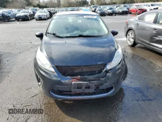 2012 Ford Fiesta SE z VIN 3FADP4EJ4CM183237, wystawiony jako Copart lot #48825605 z przebiegiem 92 798 mil mil oraz Szkoda całkowita • Salvage title. Historia ofert i sprzedaży dostępna na DreamBid. Obrazek 5.