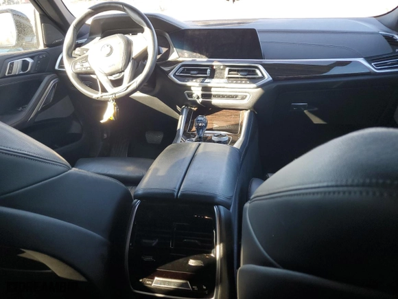 2021 BMW X6 xDrive40i with VIN 5UXCY6C07M9D94944, listed as a Copart auction lot 77106334 with 52,106 mi miles and Salvage Title. Bid and sale history available at carsss.com. Image 8.