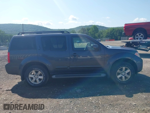 2012 Nissan Pathfinder Silver Edition z VIN 5N1AR1NB4CC632556, wystawiony jako IAAI lot #42547467 z przebiegiem 169 638 mil mil oraz . Historia ofert i sprzedaży dostępna na DreamBid. Obrazek 13.
