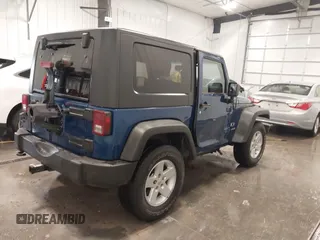 2009 Jeep Wrangler X with VIN 1J4FA24149L728979, listed as a IAAI auction lot 41905455 with 144,221 mi miles and . Bid and sale history available at DreamBid. Image 4.