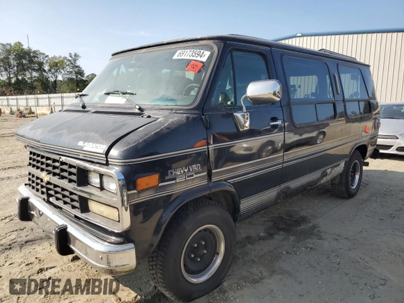 1994 Chevrolet Chevy Van z VIN 1GBEG25K3RF178166, wystawiony jako Copart lot #69173594 z przebiegiem 143 577 mil mil oraz Szkody całkowita. Historia ofert i sprzedaży dostępna na DreamBid. Obrazek 1.