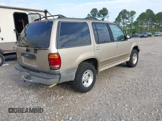 1999 Ford Explorer XLT with VIN 1FMZU34E3XUA80301, listed as a IAAI auction lot 42094304 with 145,373 mi miles and . Bid and sale history available at DreamBid. Image 4.