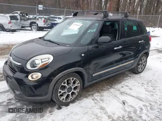 2014 FIAT 500L Trekking with VIN ZFBCFADHXEZ007139, listed as a IAAI auction lot 41359433 with 65,386 mi miles and . Bid and sale history available at DreamBid. Image 2.