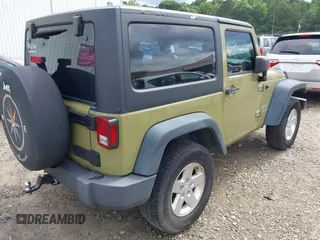 2013 Jeep Wrangler Sport z VIN 1C4AJWAG8DL535534, wystawiony jako IAAI lot #42454222 z przebiegiem 120 355 mil mil oraz . Historia ofert i sprzedaży dostępna na DreamBid. Obrazek 4.