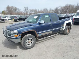 1999 Chevrolet Silverado 1500 LT with VIN 1GCEK19T3XE123498, listed as a IAAI auction lot 41801019 with 213,646 mi miles. Bid and sale history available at carsss.com. Image 18.