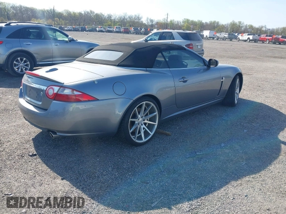 2007 Jaguar XK with VIN SAJWA44B075B11143, listed as a IAAI auction lot 42044257 with 122,842 mi miles. Bid and sale history available at carsss.com. Image 4.
