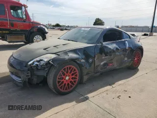 2007 Nissan 350Z with VIN JN1BZ34D97M504887, listed as a Copart auction lot 77140104 with 115,128 mi miles and Salvage Title. Bid and sale history available at DreamBid. Image 1.