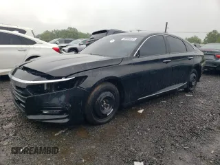 2018 Honda Accord Touring z VIN 1HGCV1F9XJA010347, wystawiony jako Copart lot #59583525 z przebiegiem Nie podano mil oraz Szkoda całkowita • Salvage title. Historia ofert i sprzedaży dostępna na DreamBid. Obrazek 1.
