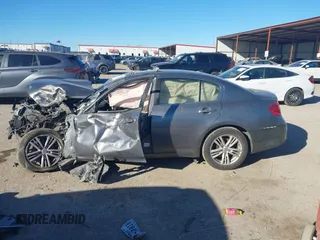 2012 Infiniti G25 Journey z VIN JN1DV6AP6CM810606, wystawiony jako IAAI lot #41254533 z przebiegiem Nie podano mil oraz . Historia ofert i sprzedaży dostępna na DreamBid. Obrazek 14.