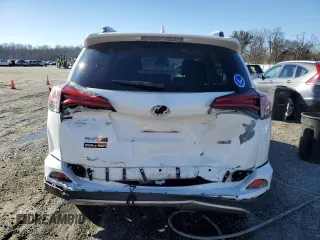 2018 Toyota RAV4 XLE with VIN 2T3WFREV2JW454202, listed as a Copart auction lot 41599855 with 144,442 mi miles and Salvage title. Bid and sale history available at DreamBid. Image 6.