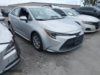 2021 Toyota Corolla LE with VIN 5YFEPMAE2MP212056, listed as a IAAI auction lot 41883519 with 69,215 mi miles. Bid and sale history available at carsss.com. Image 1.