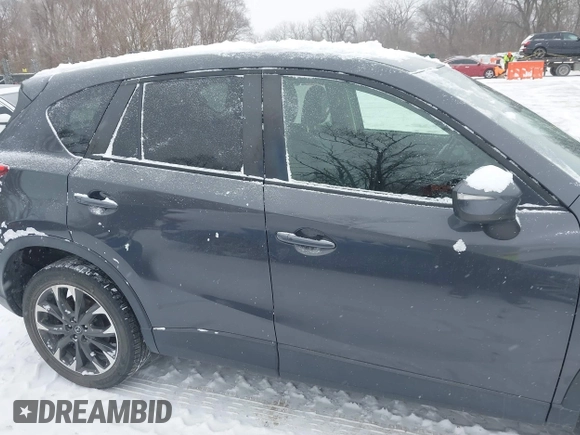 2016 Mazda CX-5 Grand Touring with VIN JM3KE4DY2G0913412, listed as a IAAI auction lot 41616132 with 85,166 mi miles. Bid and sale history available at carsss.com. Image 13.