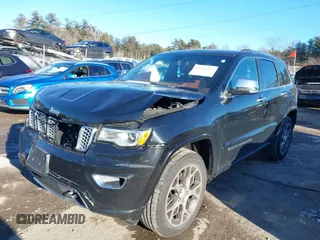 2021 Jeep Grand Cherokee Overland with VIN 1C4RJFCG3MC601150, listed as a IAAI auction lot 41421403 with 165,614 mi miles and . Bid and sale history available at DreamBid. Image 17.