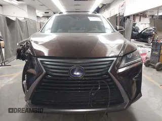 2016 Lexus RX 450h with VIN 2T2BGMCA1GC005462, listed as a IAAI auction lot 42304457 with 87,248 mi miles and . Bid and sale history available at DreamBid. Image 12.