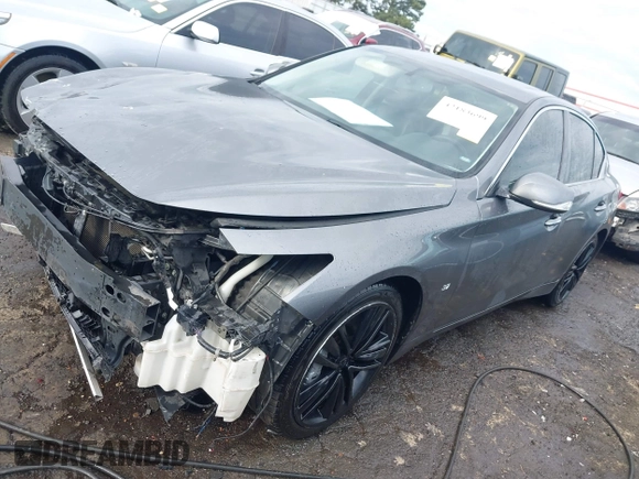 2014 Infiniti Q50 Premium with VIN JN1BV7AP8EM693109, listed as a IAAI auction lot 42183699 with 171,981 mi miles and . Bid and sale history available at DreamBid. Image 18.