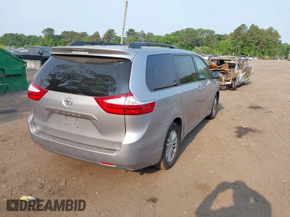 2015 Toyota Sienna XLE with VIN 5TDYK3DC2FS582546, listed as a IAAI auction lot 42443288 with 274,214 mi miles and . Bid and sale history available at DreamBid. Image 4.