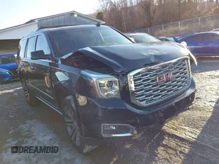 2019 GMC Yukon Denali with VIN 1GKS2CKJ2KR137664, listed as a IAAI auction lot 41335229 with 151,394 mi miles and . Bid and sale history available at DreamBid. Image 6.
