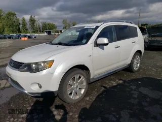 2009 Mitsubishi Outlander SE z VIN JA4MT31W69Z001475, wystawiony jako Copart lot #74098814 z przebiegiem 142 351 mil mil oraz Szkoda całkowita • Salvage title. Historia ofert i sprzedaży dostępna na DreamBid. Obrazek 1.
