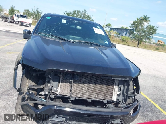 2023 Ford F-150 XL with VIN 1FTEW1C56PFC28013, listed as a IAAI auction lot 42242994 with Not Provided miles and . Bid and sale history available at DreamBid. Image 12.